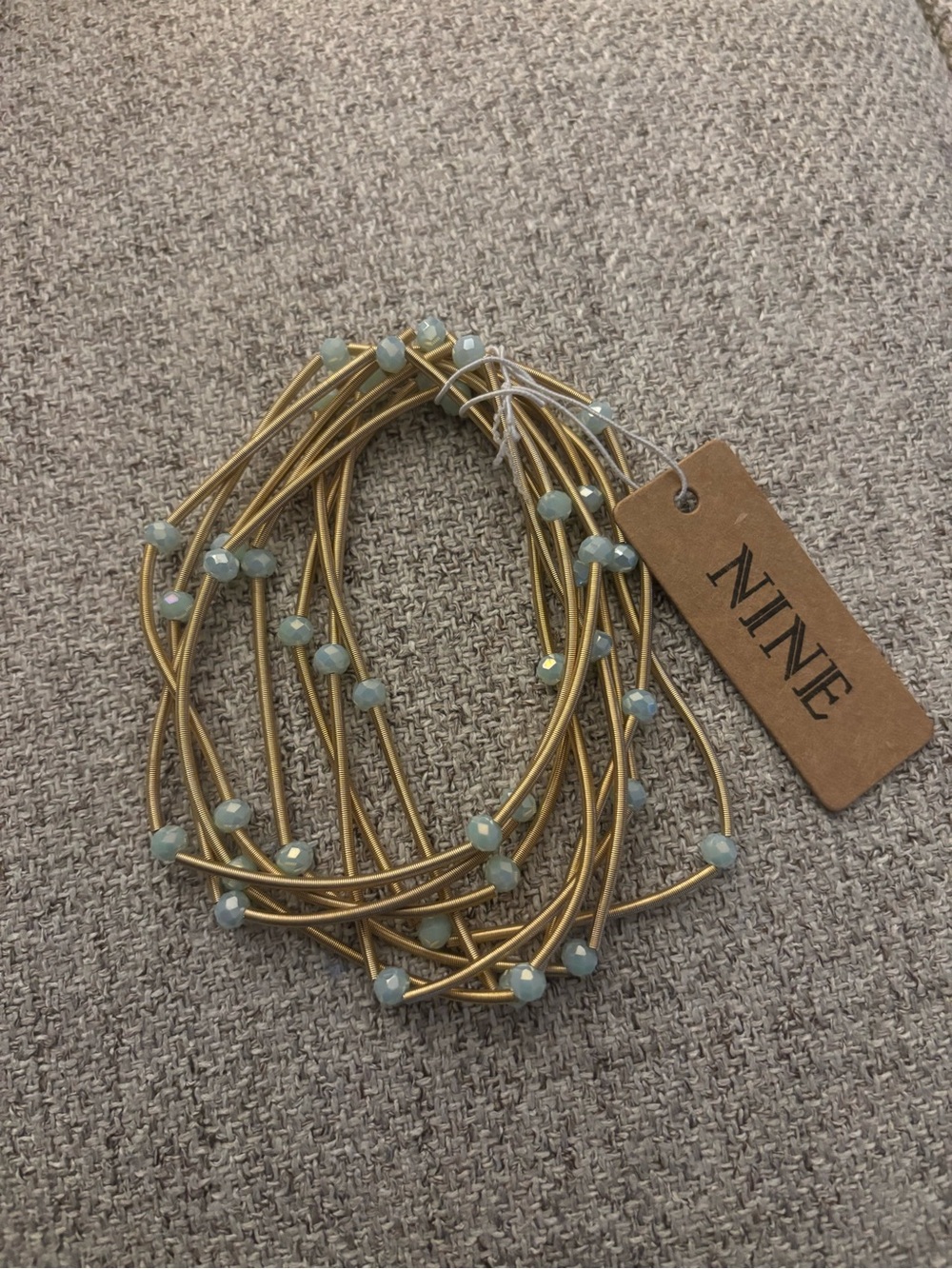 Gold-Tone Multi-Strand Bracelet with Pale Blue Beads